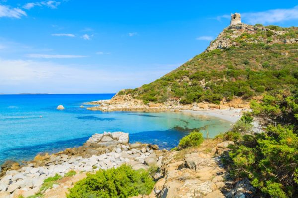 Crystal clear water of Porto Giunco bay with sandy beach, Sardinia island, Italy